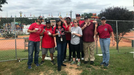 CALS' Food Science team "feels more like a family," says Fred Jimenez, here with the team at the state fair