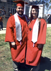Kyle and Sara Mayberry in cap and gown, graduating from NC State.